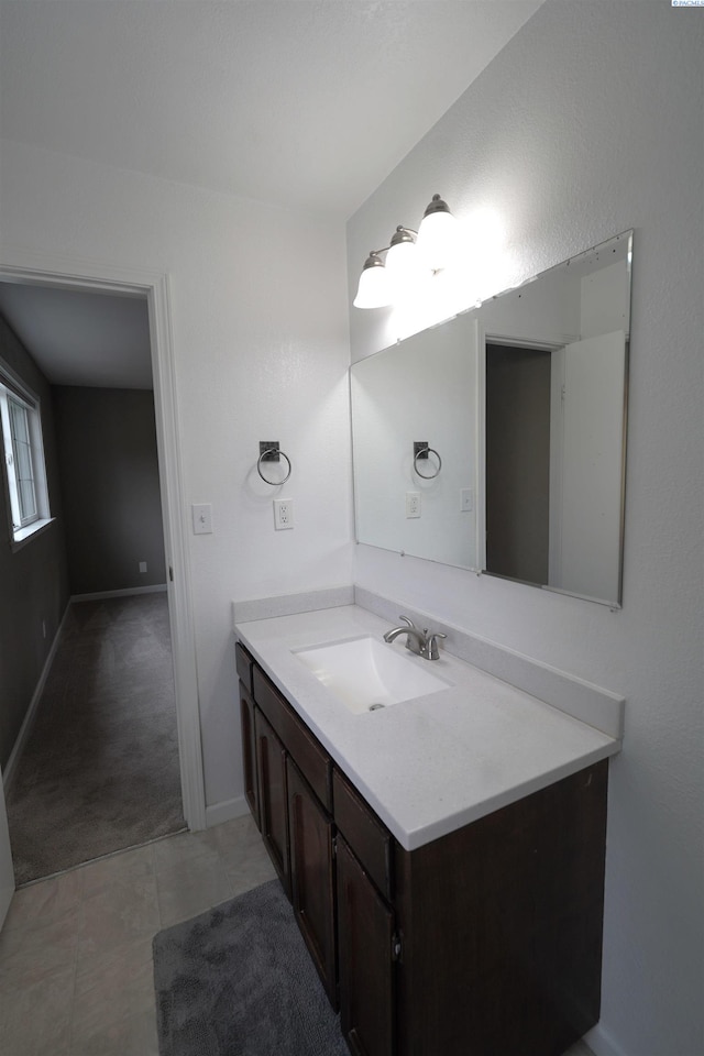 610 Dilke St, Pullman, WA 99163 - bathroom with vanity and baseboards