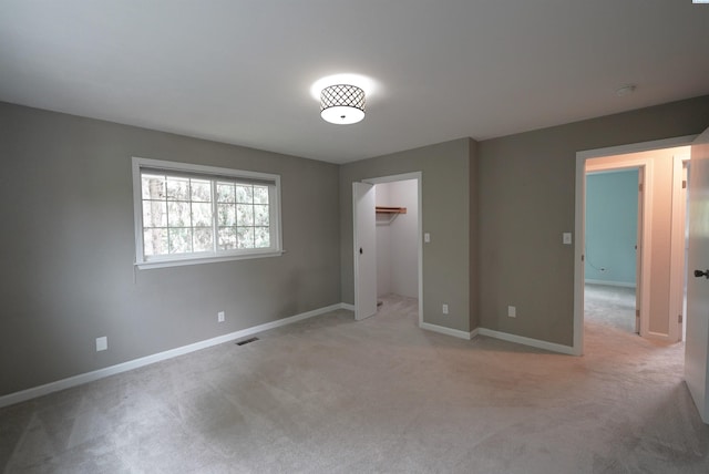 610 Dilke St, Pullman, WA 99163 - unfurnished bedroom with light carpet and a spacious closet