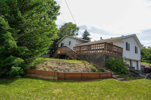 610 Dilke St, Pullman, WA 99163 - rear view of property with stairs, a deck, a lawn, and an attached garage