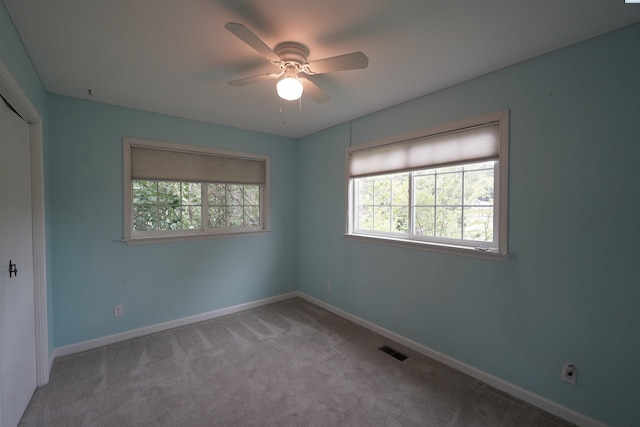 610 Dilke St, Pullman, WA 99163 - unfurnished bedroom with carpet floors and a ceiling fan