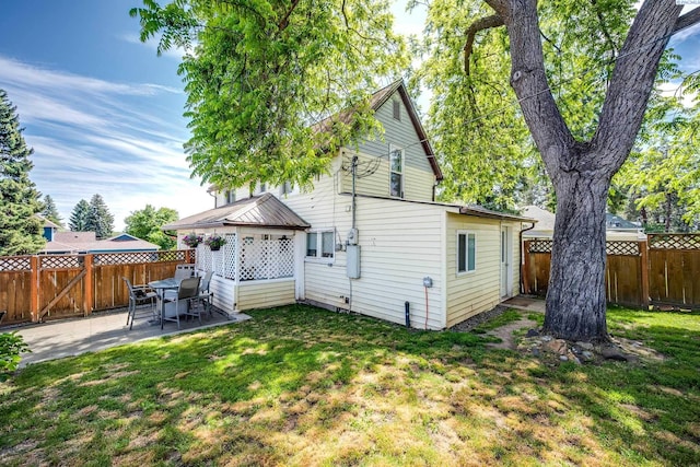 110 W Cannon St, Palouse, WA 99161 - rear view of house featuring a patio