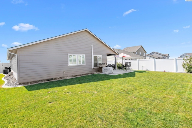 6217 Sidon Ln, Pasco, WA 99301 - back of house with a patio area