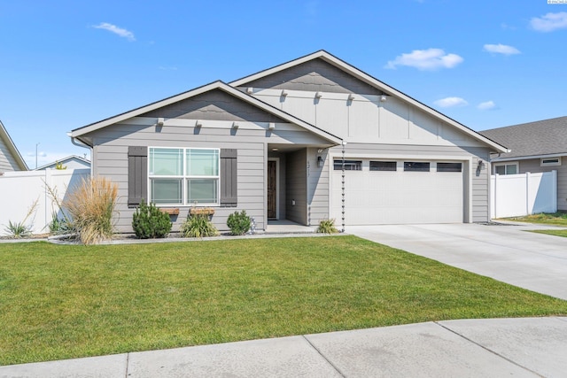 6217 Sidon Ln, Pasco, WA 99301 - view of front of house featuring a garage and concrete driveway
