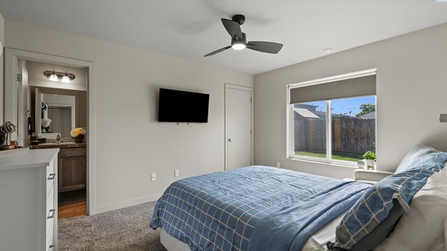 520 Whitefish Ln, Pasco, WA 99301 - carpeted bedroom with ceiling fan and ensuite bath