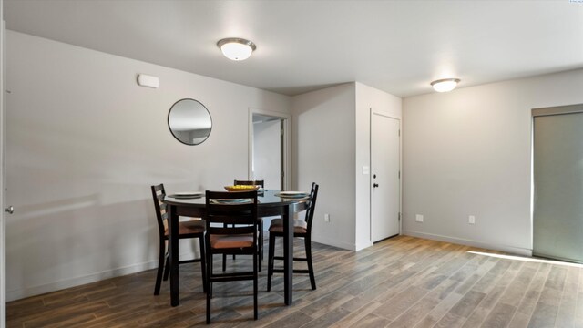 520 Whitefish Ln, Pasco, WA 99301 - dining room with wood finished floors and baseboards