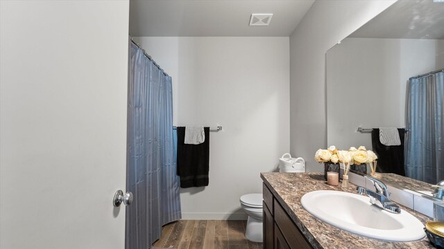 520 Whitefish Ln, Pasco, WA 99301 - bathroom with vanity, wood finished floors, and a shower with curtain