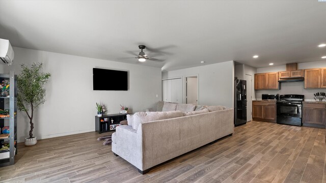 520 Whitefish Ln, Pasco, WA 99301 - living room featuring a ceiling fan, light wood finished floors, and recessed lighting