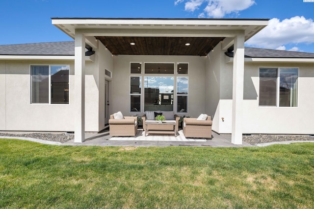 rear view of property with stucco siding, an outdoor hangout area, roof with shingles, a patio area, and a lawn