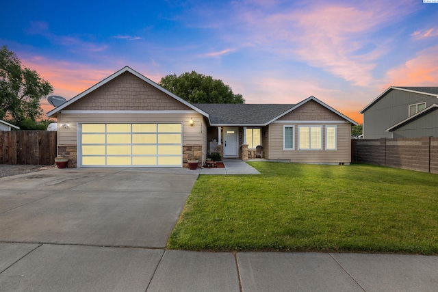 1716 W 40th Ave, Kennewick, WA 99337 - single story home featuring a garage, concrete driveway, and stone siding