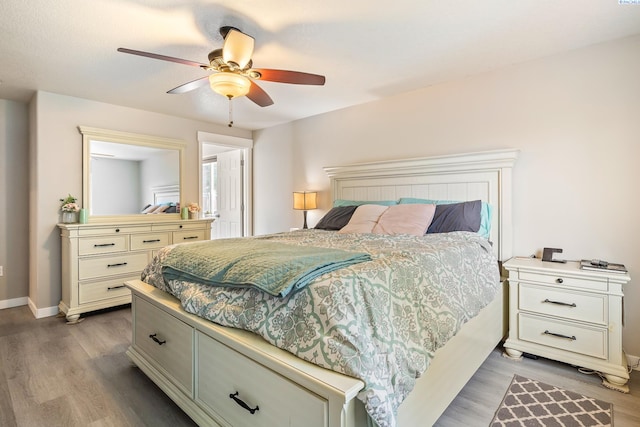 1716 W 40th Ave, Kennewick, WA 99337 - bedroom with light wood finished floors and a ceiling fan