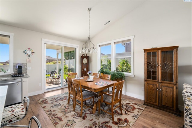 3763 S Sherman St, Kennewick, WA 99338 - dining space featuring plenty of natural light, light wood-style flooring, lofted ceiling, and a chandelier