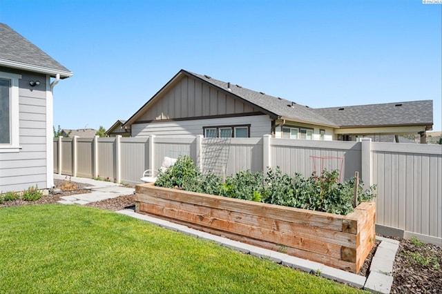 3763 S Sherman St, Kennewick, WA 99338 - fenced backyard with a vegetable garden