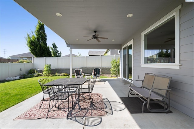 3763 S Sherman St, Kennewick, WA 99338 - fenced backyard featuring a ceiling fan, a patio area, and outdoor dining area