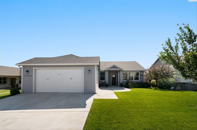 3763 S Sherman St, Kennewick, WA 99338 - ranch-style house with a front lawn and concrete driveway