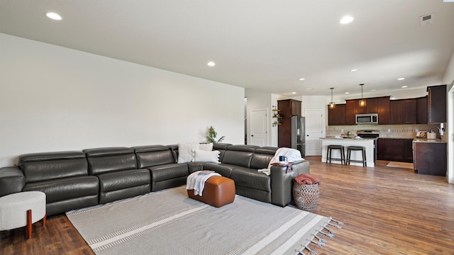 76704 E Timothy Ln, Kennewick, WA 99338 - living room featuring recessed lighting and light wood-style floors