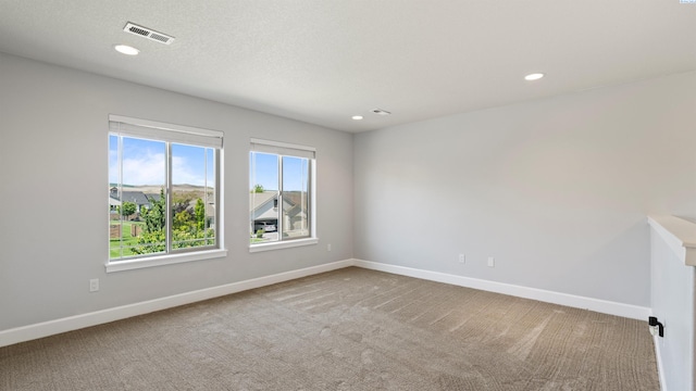 76704 E Timothy Ln, Kennewick, WA 99338 - empty room with carpet floors, baseboards, and recessed lighting
