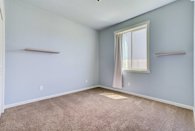 3915 Charleston Ln, Pasco, WA 99301 - carpeted spare room featuring baseboards