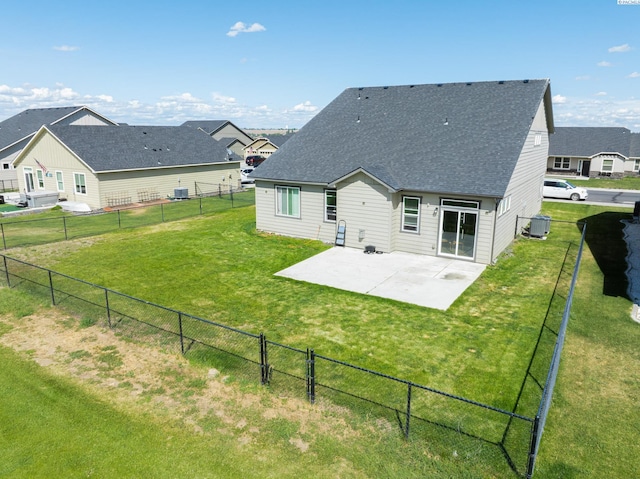 4268 Hedman Ct, Moses Lake, WA 98837 - rear view of property with a patio area, a shingled roof, and a fenced backyard