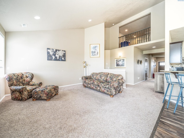 4268 Hedman Ct, Moses Lake, WA 98837 - carpeted living area with a high ceiling and recessed lighting