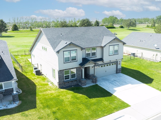 4268 Hedman Ct, Moses Lake, WA 98837 - craftsman house featuring stone siding, concrete driveway, roof with shingles, and a garage