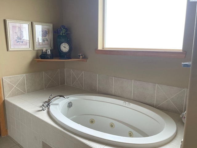 bathroom featuring a tub with jets