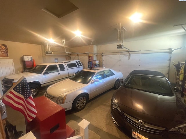 garage featuring a garage door opener