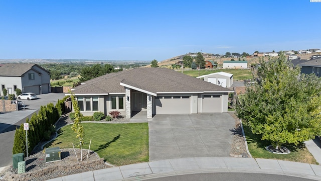 540 Athens Dr, West Richland, WA 99353 - view of front of house featuring an attached garage, driveway, a residential view, and a front yard