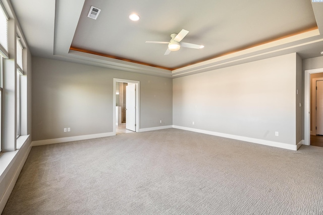 540 Athens Dr, West Richland, WA 99353 - spare room featuring a tray ceiling, a ceiling fan, light colored carpet, and recessed lighting