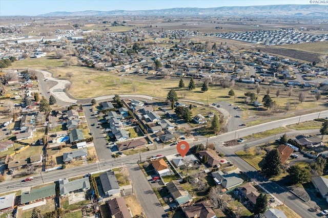 drone / aerial view featuring a mountain view