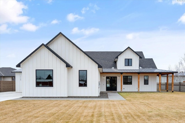 modern farmhouse with a front lawn