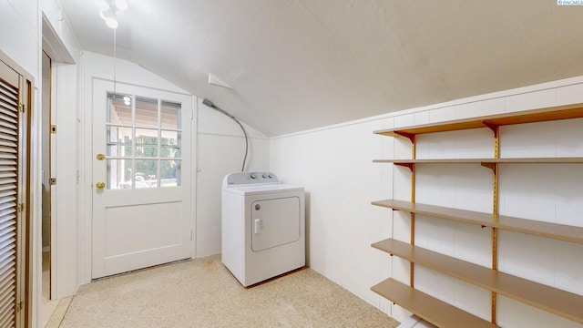 washroom featuring washer / clothes dryer and laundry area