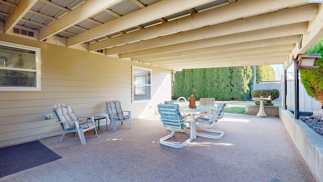 view of patio with fence