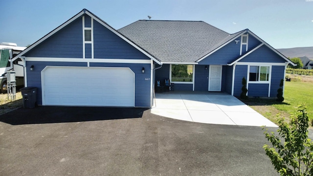 craftsman-style house with a garage