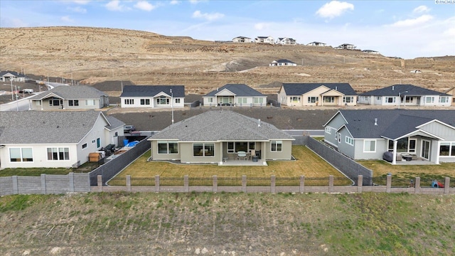 birds eye view of property with a mountain view