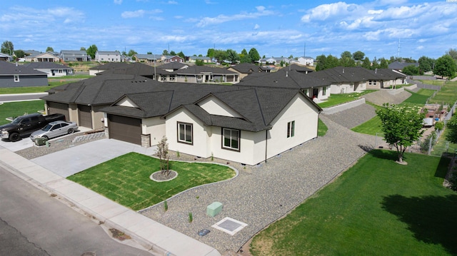 4003 Rd 96, Pasco, WA 99301 - view of front of home with a residential view, stucco siding, driveway, a garage, and a shingled roof