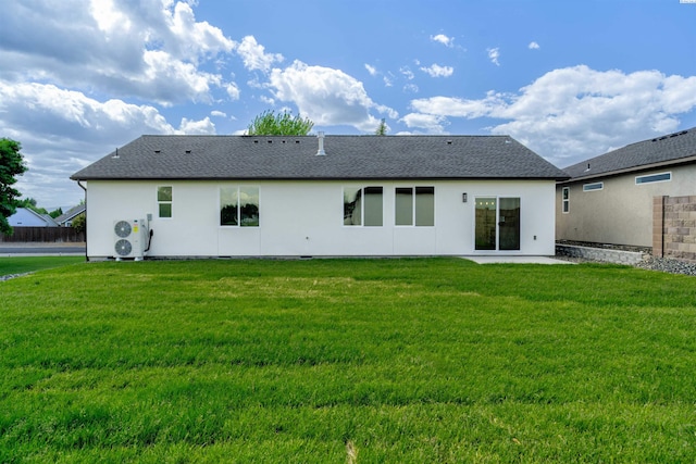 4003 Rd 96, Pasco, WA 99301 - rear view of house featuring a yard, a shingled roof, and stucco siding