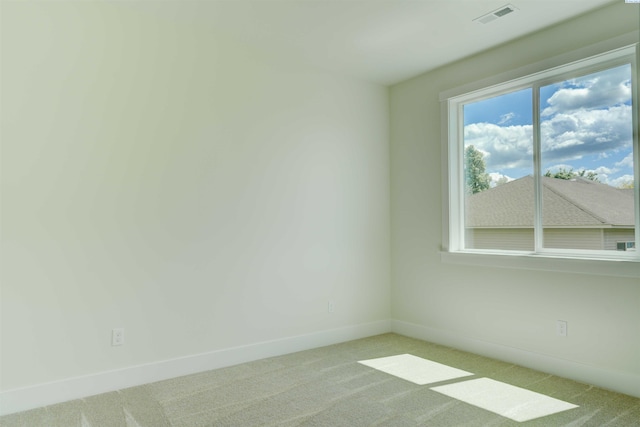 4003 Rd 96, Pasco, WA 99301 - spare room featuring light carpet and baseboards