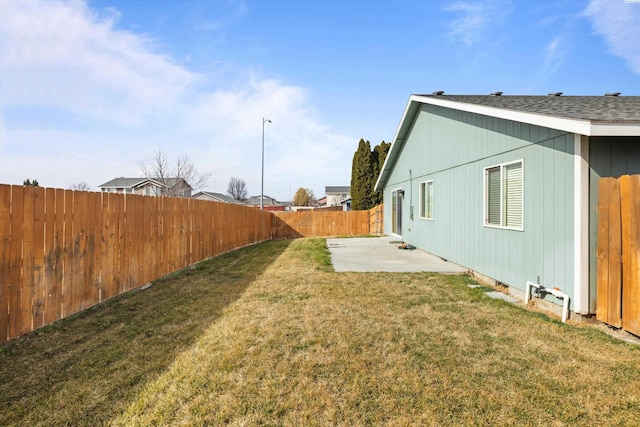 view of yard featuring a fenced backyard and a patio