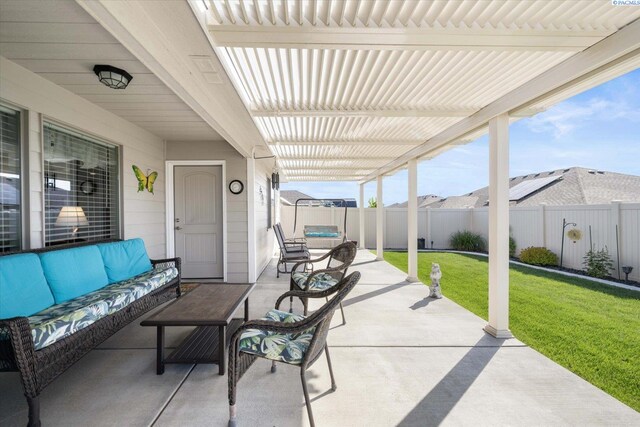 view of patio / terrace featuring an outdoor living space and a fenced backyard