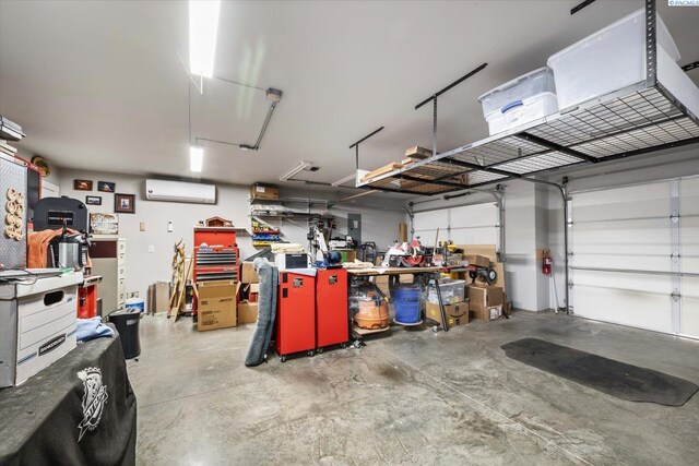 garage featuring a wall unit AC