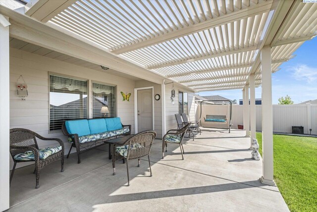 view of patio with a pergola, outdoor lounge area, and a fenced backyard