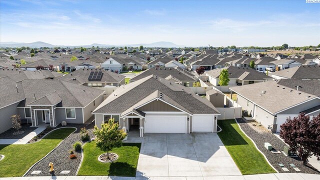 aerial view with a residential view and a mountain view