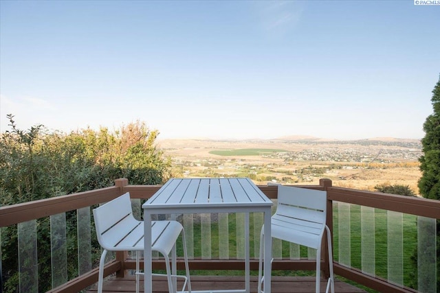 view of wooden balcony featuring a wooden deck