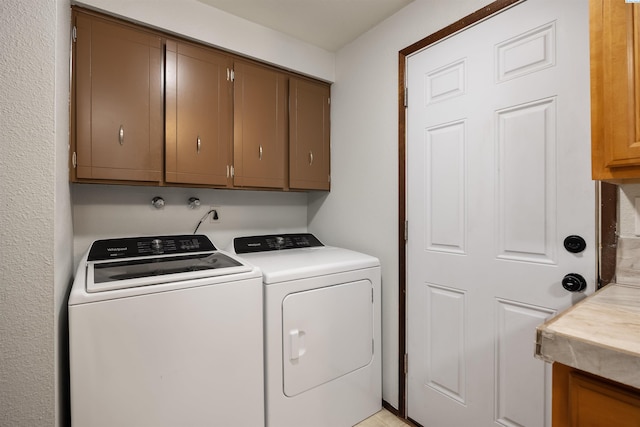 506 W 19th Ave, Kennewick, WA 99337 - washroom with cabinet space and washing machine and clothes dryer