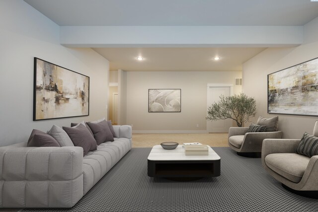 living room featuring beamed ceiling and carpet floors