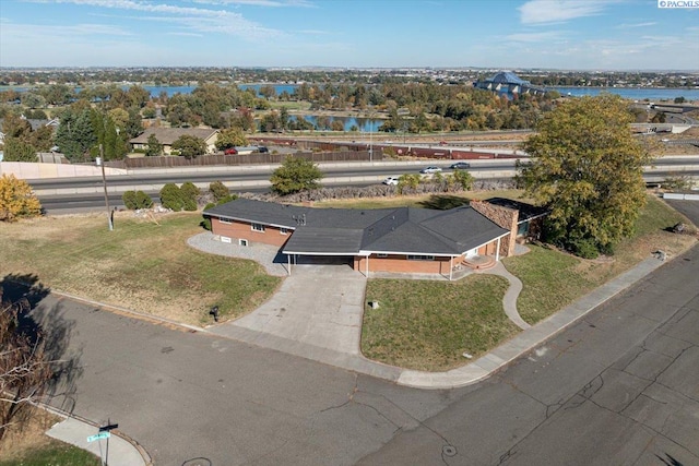 drone / aerial view with a water view