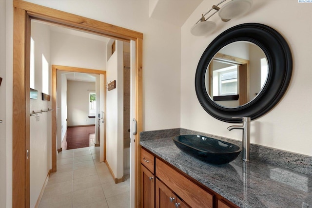 bathroom with vanity and tile patterned floors