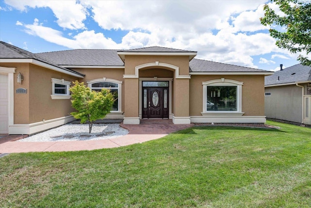 view of front of house with a front yard