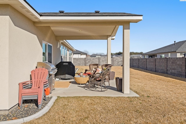 view of patio / terrace featuring a fenced backyard and area for grilling