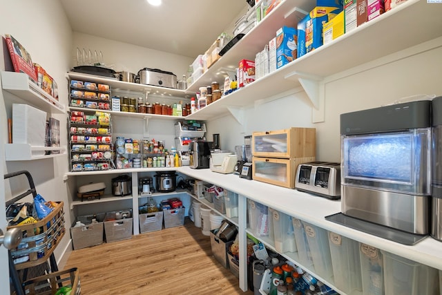 storage area featuring a toaster